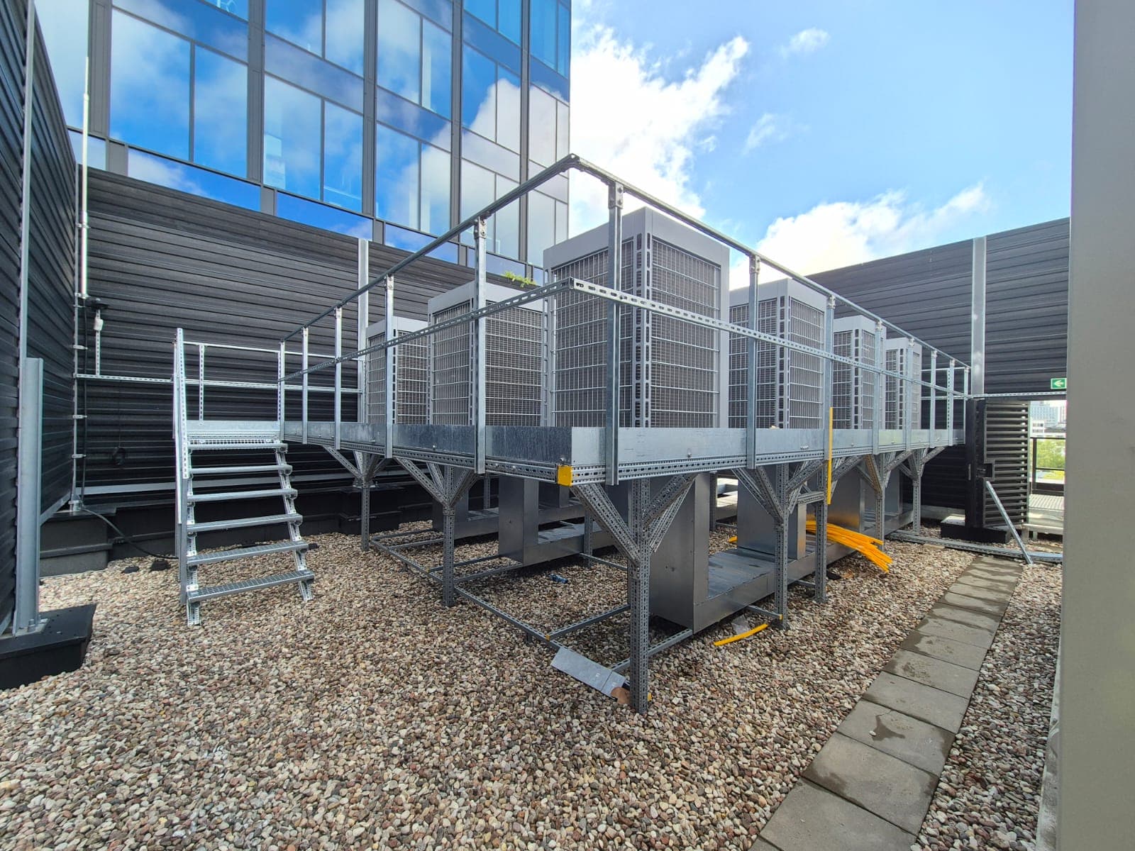 Service stairs and service walkways that ensure safe and convenient access to cooling units